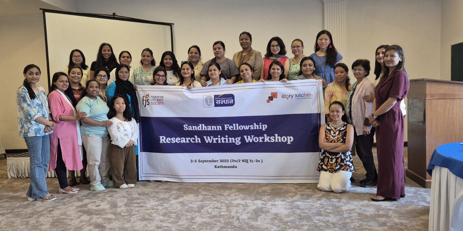 Banner image for Sandhaann fellowship where every participant is standing with program banner in the middle